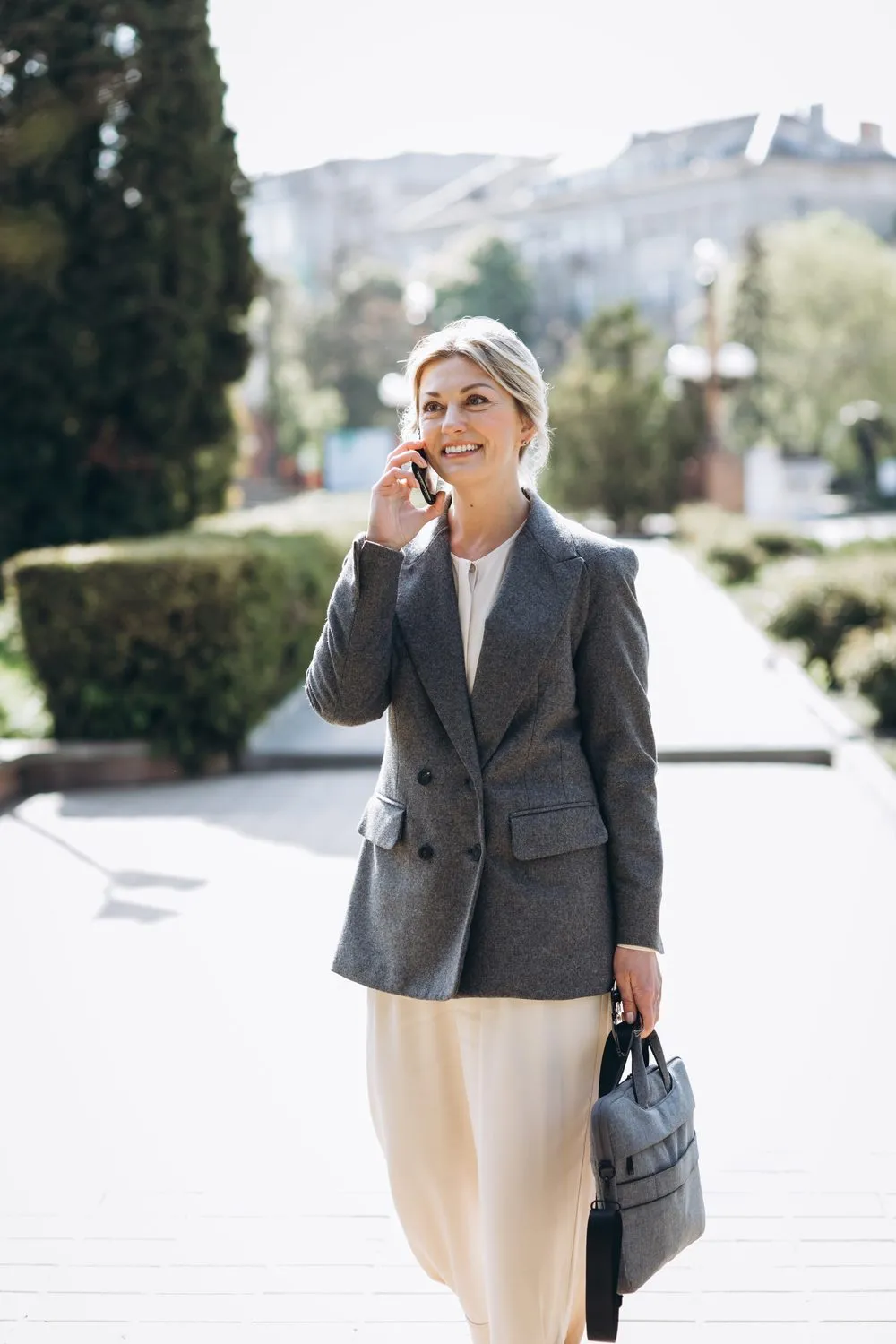 A professional woman talking on the phone